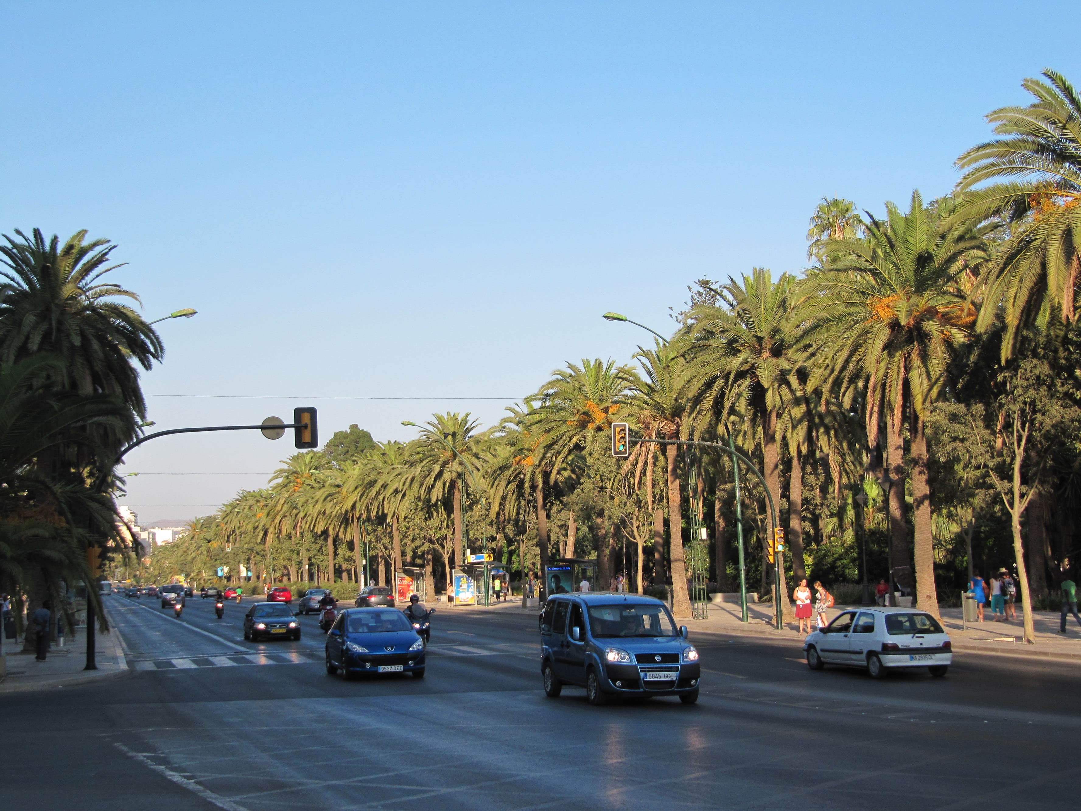 Málaga's Paseo del Parque, its gardens and palm trees running along the port